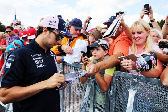 Sergio Perez (MEX) Force India F1 Team signs autographs for the fans.
23.08.2018. Formula 1 World Championship, Rd 13, Belgian Grand Prix, Spa Francorchamps, Belgium, Preparation Day.
- www.xpbimages.com, EMail: requests@xpbimages.com - copy of publication required for printed pictures. Every used picture is fee-liable. © Copyright: Moy / XPB Images