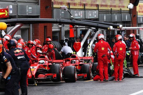 Sebastian Vettel (GER) Ferrari SF71H and Kimi Raikkonen (FIN) Ferrari SF71H in the pits.
25.08.2018. Formula 1 World Championship, Rd 13, Belgian Grand Prix, Spa Francorchamps, Belgium, Qualifying Day.
- www.xpbimages.com, EMail: requests@xpbimages.com - copy of publication required for printed pictures. Every used picture is fee-liable. © Copyright: Batchelor / XPB Images