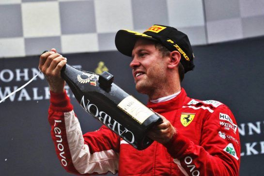 Race winner Sebastian Vettel (GER) Ferrari celebrates on the podium.
26.08.2018. Formula 1 World Championship, Rd 13, Belgian Grand Prix, Spa Francorchamps, Belgium, Race Day.
- www.xpbimages.com, EMail: requests@xpbimages.com - copy of publication required for printed pictures. Every used picture is fee-liable. © Copyright: Photo4 / XPB Images