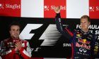 SIngapore 2013: Fernando Alonso (ESP) Ferrari and Sebastian Vettel (GER) Red Bull Racing.