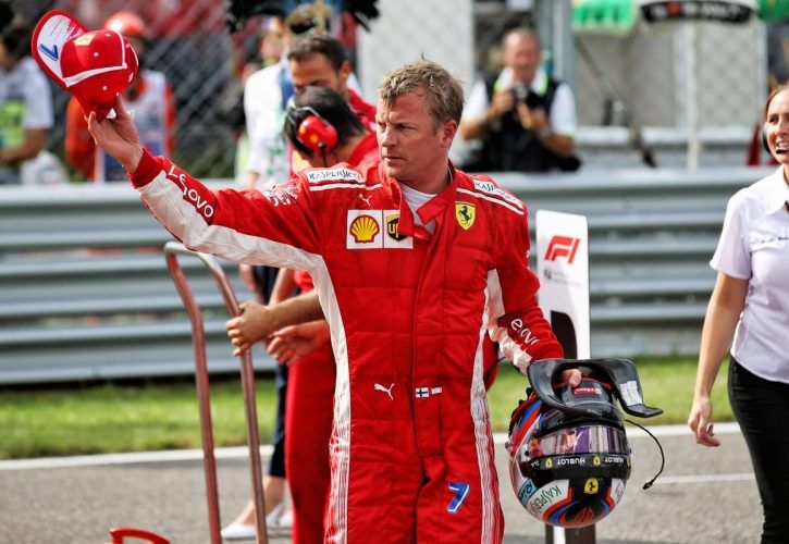 Pole sitter Kimi Raikkonen (FIN) Ferrari in qualifying parc ferme.