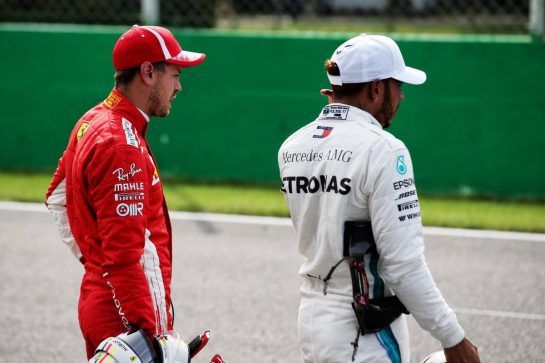 (L to R): Sebastian Vettel (GER) Ferrari and Lewis Hamilton (GBR) Mercedes AMG F1 in qualifying parc ferme.
01.09.2018. Formula 1 World Championship, Rd 14, Italian Grand Prix, Monza, Italy, Qualifying Day.
- www.xpbimages.com, EMail: requests@xpbimages.com - copy of publication required for printed pictures. Every used picture is fee-liable. © Copyright: Batchelor / XPB Images