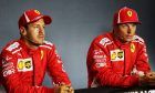 Sebastian Vettel (GER) Ferrari and Kimi Raikkonen (FIN) Ferrari in the post qualifying FIA Press Conference.