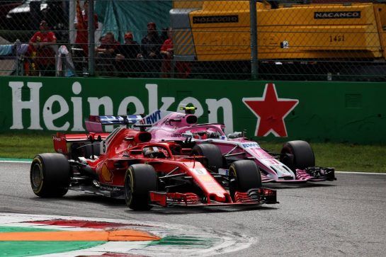 Sebastian Vettel (GER) Ferrari SF71H and Esteban Ocon (FRA) Racing Point Force India F1 VJM11 battle for position.
02.09.2018. Formula 1 World Championship, Rd 14, Italian Grand Prix, Monza, Italy, Race Day.
- www.xpbimages.com, EMail: requests@xpbimages.com - copy of publication required for printed pictures. Every used picture is fee-liable. © Copyright: Batchelor / XPB Images