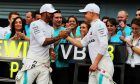 Race winner Lewis Hamilton (GBR) Mercedes AMG F1 celebrates with third placed Valtteri Bottas