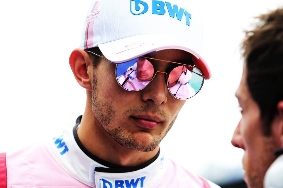Esteban Ocon (FRA) Racing Point Force India F1 Team on the grid.