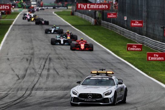 Kimi Raikkonen (FIN) Ferrari SF71H leads behind the FIA Safety Car.
02.09.2018. Formula 1 World Championship, Rd 14, Italian Grand Prix, Monza, Italy, Race Day.
- www.xpbimages.com, EMail: requests@xpbimages.com - copy of publication required for printed pictures. Every used picture is fee-liable. © Copyright: Moy / XPB Images