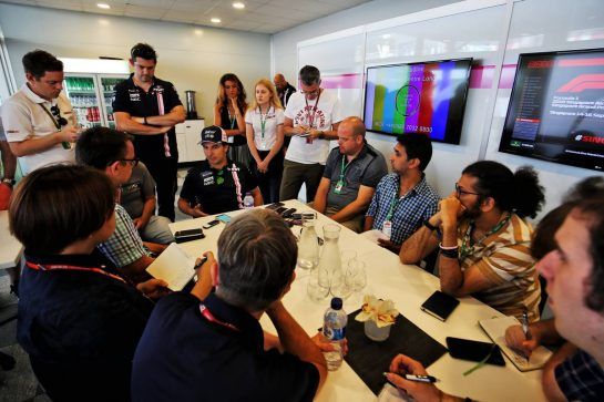 Sergio Perez (MEX) Racing Point Force India F1 Team with the media.
13.09.2018. Formula 1 World Championship, Rd 15, Singapore Grand Prix, Marina Bay Street Circuit, Singapore, Preparation Day.
- www.xpbimages.com, EMail: requests@xpbimages.com - copy of publication required for printed pictures. Every used picture is fee-liable. © Copyright: Moy / XPB Images