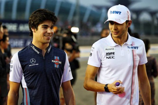 (L to R): Lance Stroll (CDN) Williams with Esteban Ocon (FRA) Racing Point Force India F1 Team on the drivers parade.
16.09.2018. Formula 1 World Championship, Rd 15, Singapore Grand Prix, Marina Bay Street Circuit, Singapore, Race Day.
- www.xpbimages.com, EMail: requests@xpbimages.com - copy of publication required for printed pictures. Every used picture is fee-liable. © Copyright: Batchelor / XPB Images