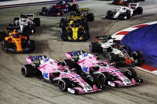 Esteban Ocon (FRA) Racing Point Force India F1 VJM11 and team mate Sergio Perez (MEX) Racing Point Force India F1 VJM11 at the start of the race.
16.09.2018. Formula 1 World Championship, Rd 15, Singapore Grand Prix, Marina Bay Street Circuit, Singapore, Race Day.
- www.xpbimages.com, EMail: requests@xpbimages.com - copy of publication required for printed pictures. Every used picture is fee-liable. © Copyright: Charniaux / XPB Images