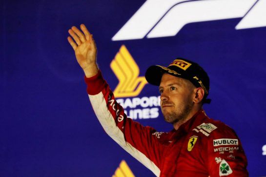 Sebastian Vettel (GER) Ferrari celebrates his third position on the podium.
16.09.2018. Formula 1 World Championship, Rd 15, Singapore Grand Prix, Marina Bay Street Circuit, Singapore, Race Day.
- www.xpbimages.com, EMail: requests@xpbimages.com - copy of publication required for printed pictures. Every used picture is fee-liable. © Copyright: Photo4 / XPB Images