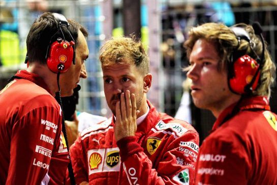 Sebastian Vettel (GER) Ferrari on the grid.
16.09.2018. Formula 1 World Championship, Rd 15, Singapore Grand Prix, Marina Bay Street Circuit, Singapore, Race Day.
- www.xpbimages.com, EMail: requests@xpbimages.com - copy of publication required for printed pictures. Every used picture is fee-liable. © Copyright: Photo4 / XPB Images