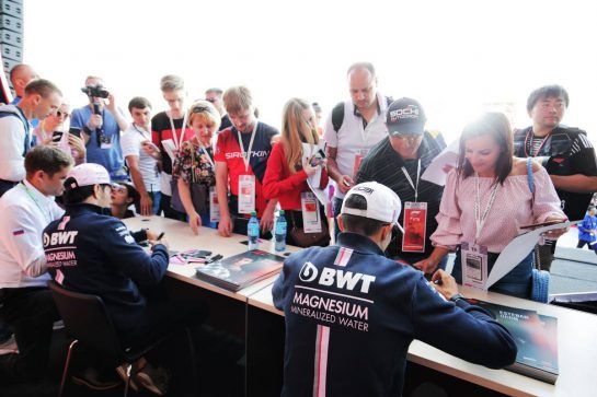 Sergio Perez (MEX) Racing Point Force India F1 Team and Esteban Ocon (FRA) Racing Point Force India F1 Team sign autographs for the fans.
27.09.2018. Formula 1 World Championship, Rd 16, Russian Grand Prix, Sochi Autodrom, Sochi, Russia, Preparation Day.
- www.xpbimages.com, EMail: requests@xpbimages.com - copy of publication required for printed pictures. Every used picture is fee-liable. © Copyright: Moy / XPB Images