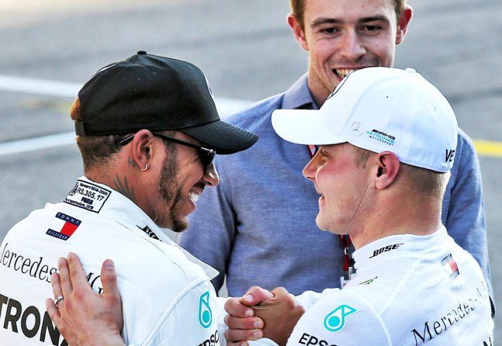 Lewis Hamilton (GBR) Mercedes AMG F1 celebrates with team mate and pole sitter Valtteri Bottas (FIN) Mercedes AMG F1 in qualifying parc ferme.