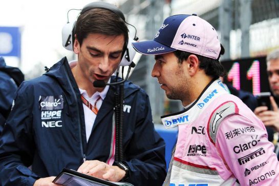 Sergio Perez (MEX) Racing Point Force India F1 Team with Tim Wright (GBR) Racing Point Force India F1 Team Race Engineer on the grid.
30.09.2018. Formula 1 World Championship, Rd 16, Russian Grand Prix, Sochi Autodrom, Sochi, Russia, Race Day.
- www.xpbimages.com, EMail: requests@xpbimages.com - copy of publication required for printed pictures. Every used picture is fee-liable. © Copyright: Moy / XPB Images