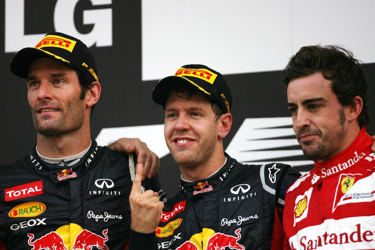 Mark Webber (AUS), Red Bull Racing, Sebastian Vettel (GER), Red Bull Racing and Fernando Alonso (ESP), Scuderia Ferrari 