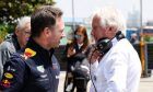 Christian Horner (GBR) Red Bull Racing Team Principal with Charlie Whiting (GBR) FIA Delegate.