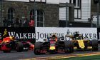 Max Verstappen (NLD) Red Bull Racing RB14 leads Nico Hulkenberg (GER) Renault