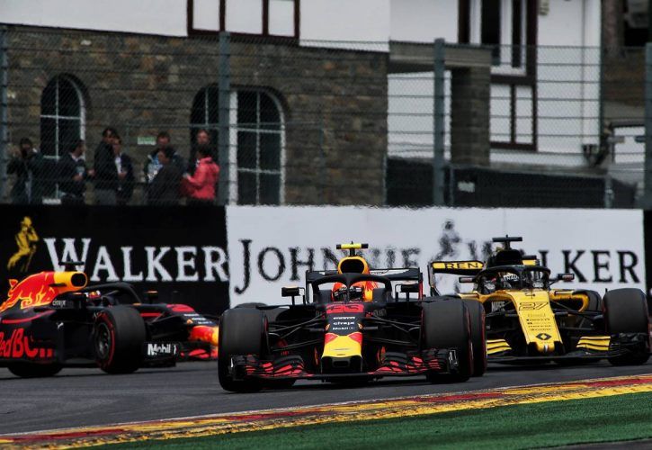 Max Verstappen (NLD) Red Bull Racing RB14 leads Nico Hulkenberg (GER) Renault