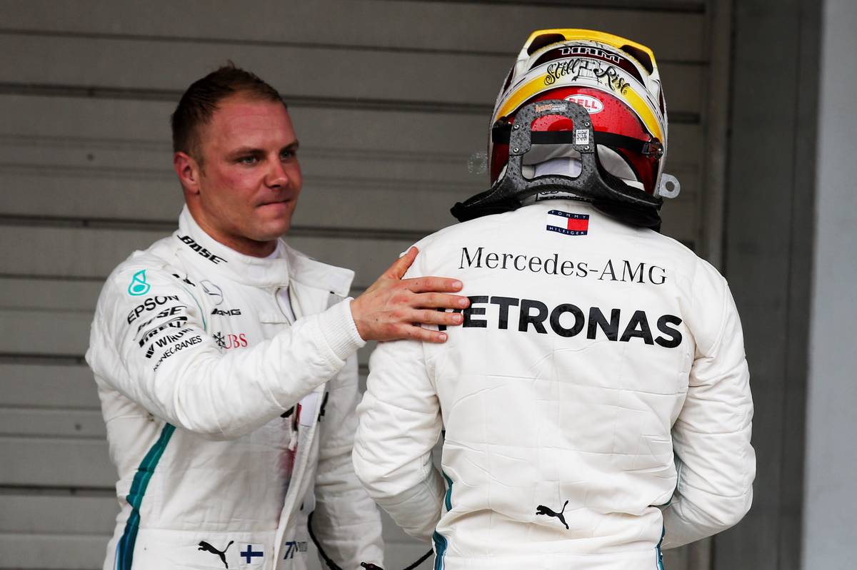 Second placed Valtteri Bottas (FIN) Mercedes AMG F1 congratulates his team mate Lewis Hamilton (GBR) Mercedes AMG F1 on his 80th pole position