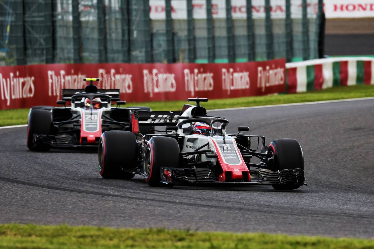 Romain Grosjean (FRA) Haas F1 Team VF-18 leads team mate Kevin Magnussen