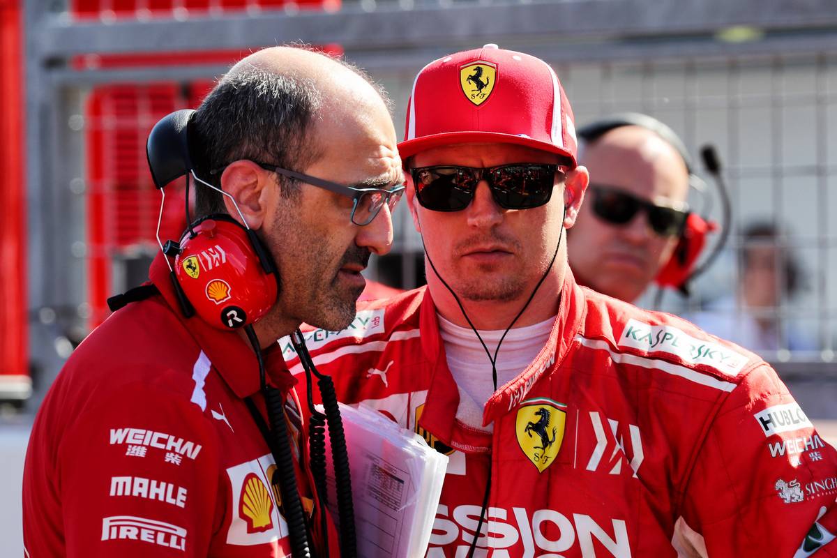 Kimi Raikkonen (FIN) Ferrari on the grid.