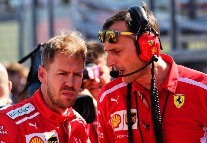 Sebastian Vettel (GER) Ferrari with Riccardo Adami (ITA) Ferrari Race Engineer on the grid.