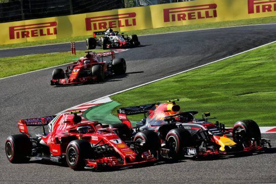 Max Verstappen (NLD) Red Bull Racing RB14 and Kimi Raikkonen (FIN) Ferrari SF71H battle for position.
07.10.2018. Formula 1 World Championship, Rd 17, Japanese Grand Prix, Suzuka, Japan, Race Day.
- www.xpbimages.com, EMail: requests@xpbimages.com - copy of publication required for printed pictures. Every used picture is fee-liable. © Copyright: Batchelor / XPB Images