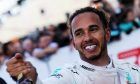 Japanese Grand Prix winner Lewis Hamilton (GBR) Mercedes AMG F1 celebrates in parc ferme.