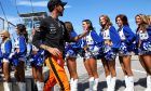 Lewis Hamilton (GBR) Mercedes AMG F1 with the Dallas Cowboys Cheerleaders on the drivers parade.
