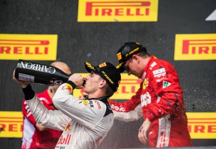 Max Verstappen (NLD) Red Bull Racing celebrates his second position on the podium.`