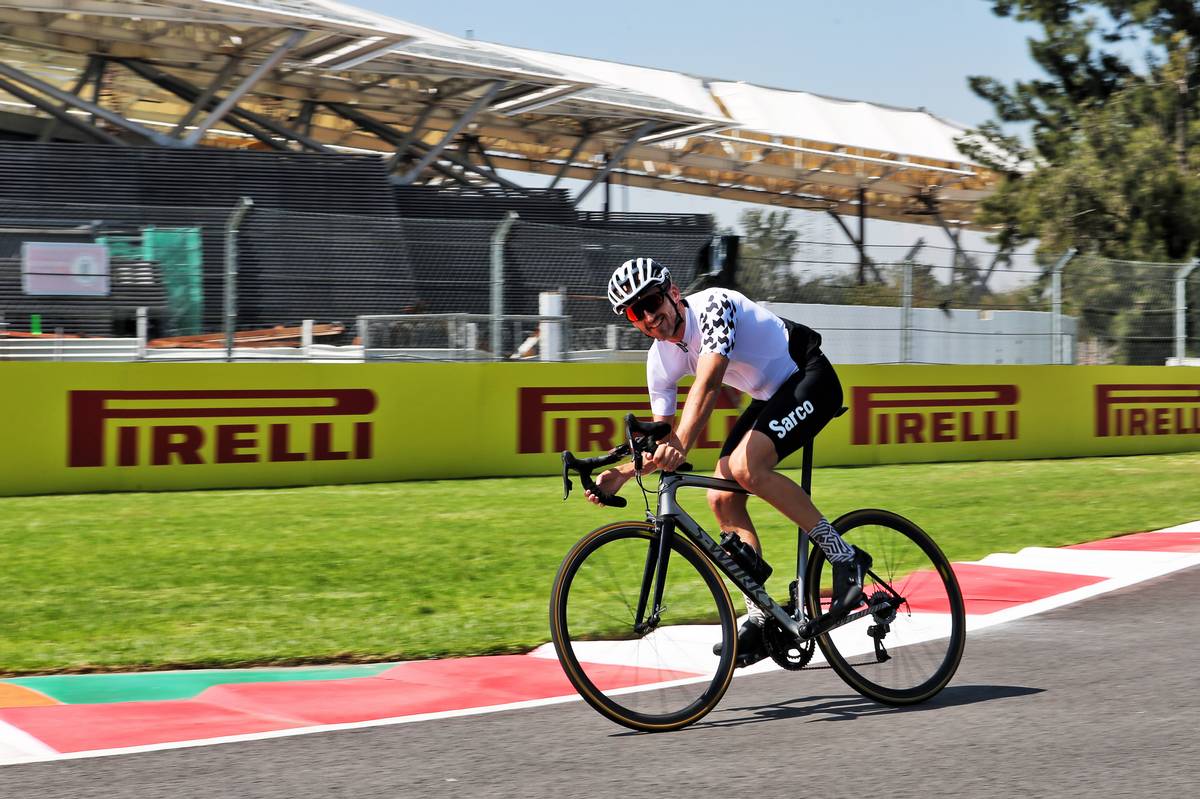 Robert Kubica (POL) Williams Reserve and Development Driver rides the circuit on his bicycle.