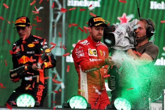Sebastian Vettel (GER) Ferrari celebrates his second position on the podium.
28.10.2018. Formula 1 World Championship, Rd 19, Mexican Grand Prix, Mexico City, Mexico, Race Day.
- www.xpbimages.com, EMail: requests@xpbimages.com - copy of publication required for printed pictures. Every used picture is fee-liable. © Copyright: Moy / XPB Images