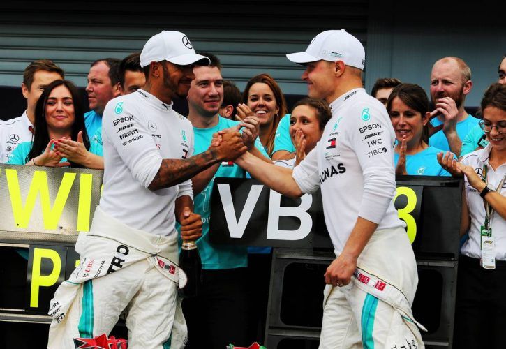 Italian GP winner Lewis Hamilton (GBR) Mercedes AMG F1 celebrates with third placed Valtteri Bottas
