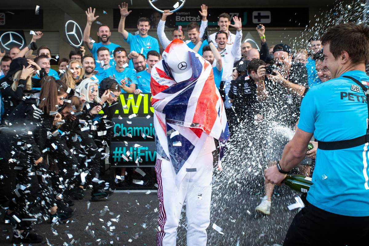 Lewis Hamilton (GBR) Mercedes AMG F1 celebrates winning the World Championship with the team