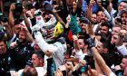 Race winner Lewis Hamilton (GBR) Mercedes AMG F1 celebrates with the team in parc ferme.