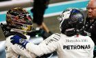 Lewis Hamilton (GBR) Mercedes AMG F1 celebrates his pole position with team mate Valtteri Bottas (FIN) Mercedes AMG F1 in qualifying parc ferme.