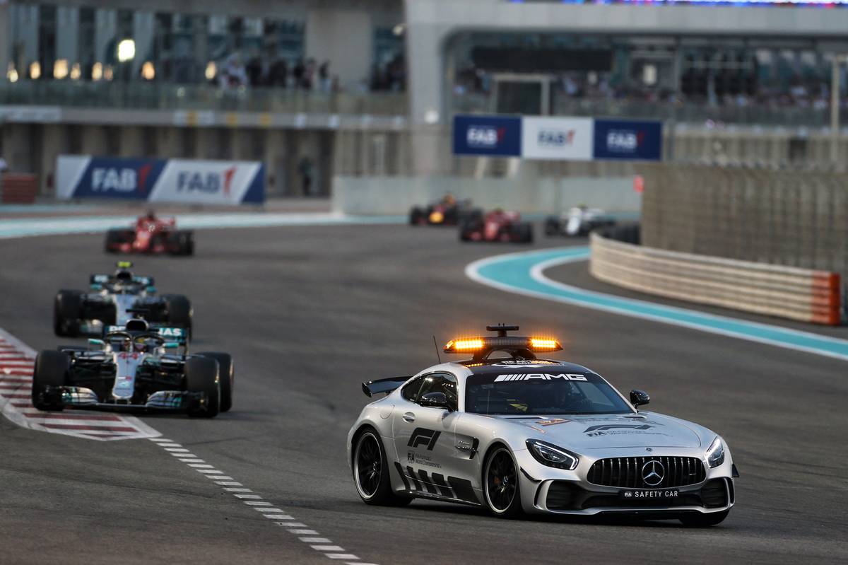Lewis Hamilton (GBR) Mercedes AMG F1 W09 leads the Abu Dhabi Grand Prix behind the FIA Safety Car.