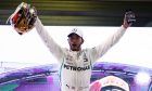 Race winner Lewis Hamilton (GBR) Mercedes AMG F1 celebrates victory in the Abu Dhabi Grand Prix in parc ferme.