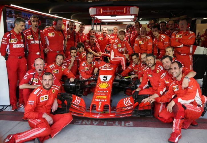 Sebastian Vettel (GER) Ferrari SF71H with his team.