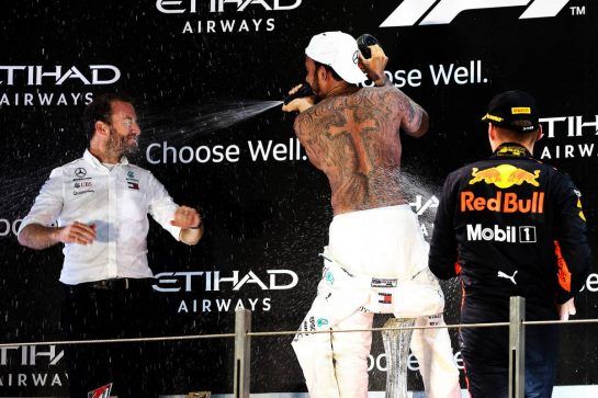 Race winner Lewis Hamilton (GBR) Mercedes AMG F1 celebrates on the podium with Bradley Lord (GBR) Mercedes AMG F1 Communications Manager and Max Verstappen (NLD) Red Bull Racing.
25.11.2018. Formula 1 World Championship, Rd 21, Abu Dhabi Grand Prix, Yas Marina Circuit, Abu Dhabi, Race Day.
- www.xpbimages.com, EMail: requests@xpbimages.com - copy of publication required for printed pictures. Every used picture is fee-liable. © Copyright: Photo4 / XPB Images