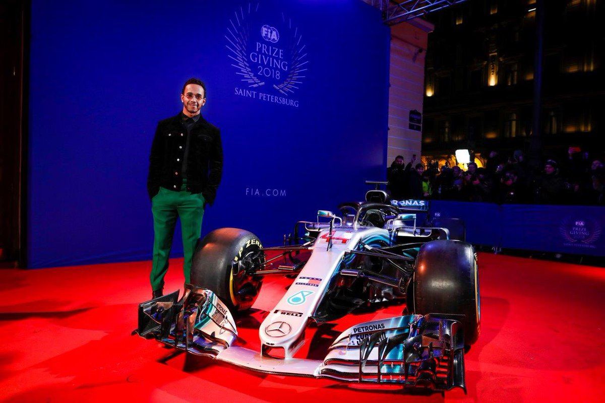 Lewis Hamilton presented with drivers' championship trophy at FIA awards  gala