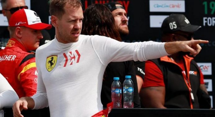 Button sees 'big year' ahead for Vettel, and perhaps a tough decision