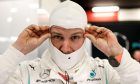 Valtteri Bottas (Mercedes) suits up.