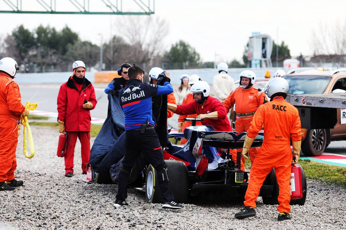 The Scuderia Toro Rosso STR14 of Alexander Albon (THA) Scuderia Toro Rosso is recovered back to the pits on the back of a truck.