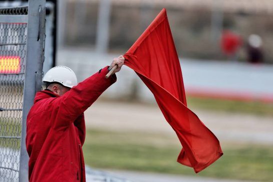 Marshal with a red flag.
20.02.2019. Formula One Testing, Day Three, Barcelona, Spain. Wednesday.
- www.xpbimages.com, EMail: requests@xpbimages.com - copy of publication required for printed pictures. Every used picture is fee-liable. © Copyright: Moy / XPB Images
