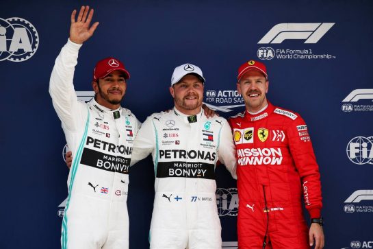 Qualifying top three in parc ferme (L to R): Lewis Hamilton (GBR) Mercedes AMG F1, second; Valtteri Bottas (FIN) Mercedes AMG F1, pole position; Sebastian Vettel (GER) Ferrari, third.
13.04.2019. Formula 1 World Championship, Rd 3, Chinese Grand Prix, Shanghai, China, Qualifying Day.
- www.xpbimages.com, EMail: requests@xpbimages.com - copy of publication required for printed pictures. Every used picture is fee-liable. © Copyright: Batchelor / XPB Images