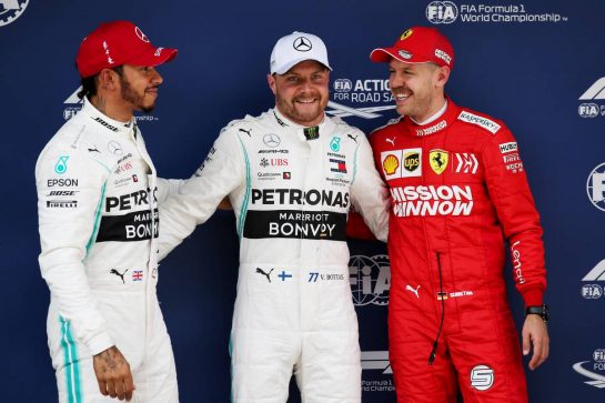 Qualifying top three in parc ferme (L to R): Lewis Hamilton (GBR) Mercedes AMG F1, second; Valtteri Bottas (FIN) Mercedes AMG F1, pole position; Sebastian Vettel (GER) Ferrari, third.
13.04.2019. Formula 1 World Championship, Rd 3, Chinese Grand Prix, Shanghai, China, Qualifying Day.
- www.xpbimages.com, EMail: requests@xpbimages.com - copy of publication required for printed pictures. Every used picture is fee-liable. © Copyright: Batchelor / XPB Images