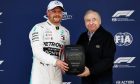 Valtteri Bottas (FIN) Mercedes AMG F1 receives the Pirelli Pole Position award from Jean Todt (FRA) FIA President in qualifying parc ferme. 13.04.2019.