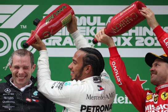 Lewis Hamilton (GBR), Mercedes AMG F1  and Sebastian Vettel (GER), Scuderia Ferrari 
14.04.2019. Formula 1 World Championship, Rd 3, Chinese Grand Prix, Shanghai, China, Race Day.
- www.xpbimages.com, EMail: requests@xpbimages.com - copy of publication required for printed pictures. Every used picture is fee-liable. © Copyright: Charniaux / XPB Images